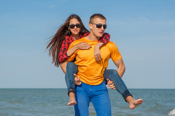 Happy young joyful guy and girl