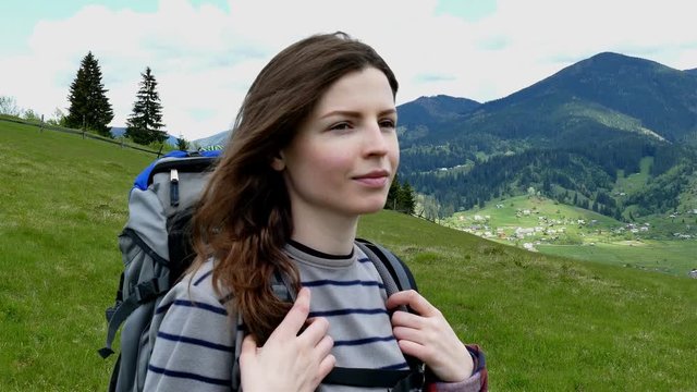 
4K. Young girl tourist with long hear in mountain hills. Steady shot
