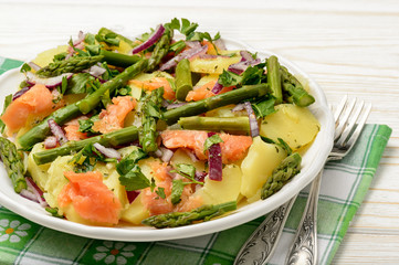 Delicious salad wit green asparagus, smoked salmon and potatoes.