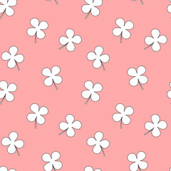 white four leaf clover on pink background seamless vector pattern illustration