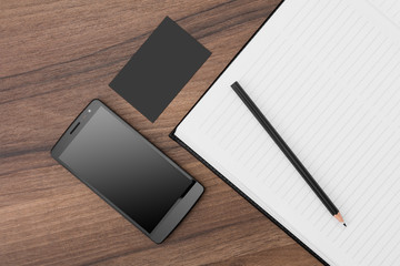 Notebook with mobile phone and business card 