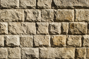 Wall from large stone blocks texture grunge background