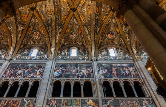 12th-century Romanesque Parma cathedral filled with Renaissance art. Its ceiling fresco by Correggio is considered a masterpiece of Renaissance fresco work.