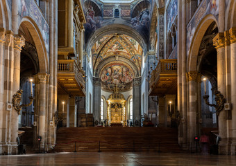 Fototapeta na wymiar 12th-century Romanesque Parma cathedral filled with Renaissance art. Its ceiling fresco by Correggio is considered a masterpiece of Renaissance fresco work.