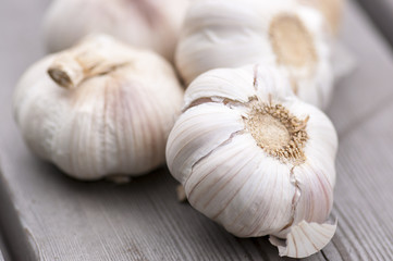 Close-up Garlic on the wooden table - kitchen interior