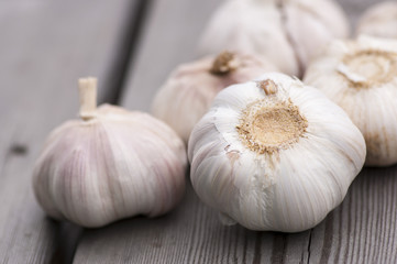 Close-up Garlic on the wooden table - kitchen interior