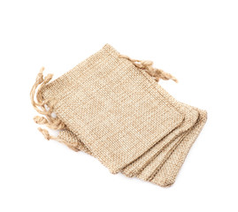 Tiny sackcloth bag isolated