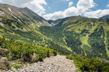 Panoramic vista over high peak mountains