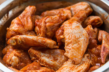 Raw spiced Chicken Wings before cokking