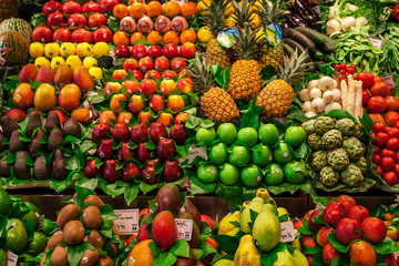Vegetable and fruit stall in Mercat de la Boqueria at Barcelona