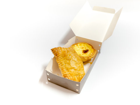 Desert, Curry puff pastry and egg tart in box on white backgroun
