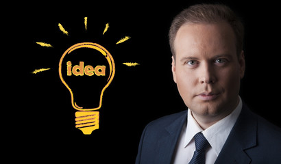 portrait of a man with an idea on a black background