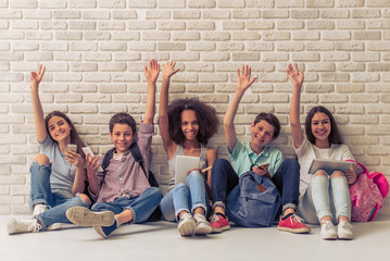 Teenagers with gadgets