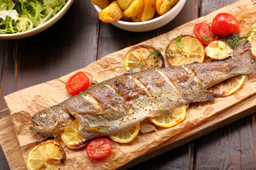 Baked fish with roasted potatoes