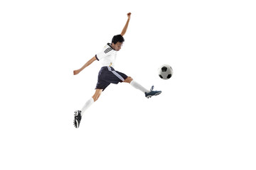 Football player of Germany kicking a ball