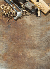  wooden table for carpenter tools with sawdust.copy space