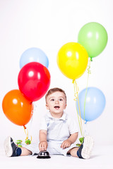  baby boy with bunch of balloons