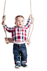 baby boy on a swing