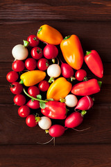 fresh vegetables on wooden background, top view, flat lay