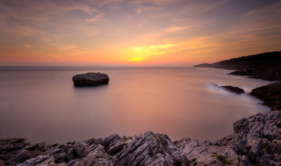 Sunrise in a cliff in Isla, Cantabria