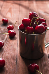Sweet cherry on wooden background