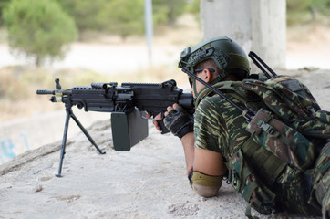 Fototapeta premium Sniper aim target Kneeling position plate cover