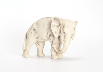 Fototapeta na wymiar Statuette elephant XIX century profile (roasting on a biscuit)