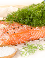 Fresh salmon fillet with spices on baking paper
