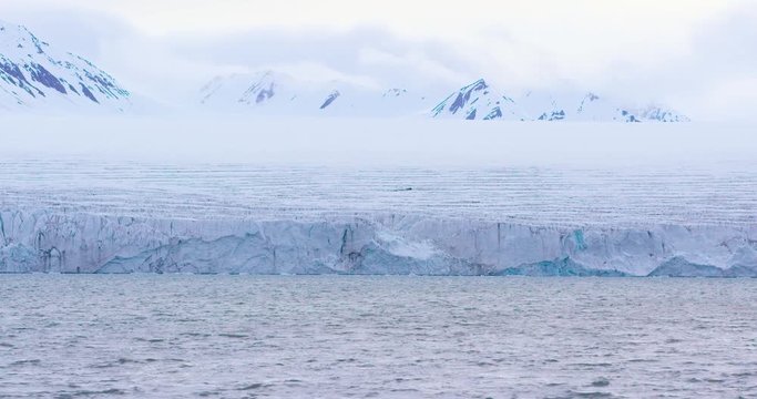 Slow motion of a massive glacier in the arctic