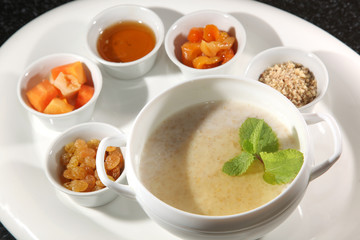 Oatmeal with toppings on plate