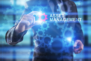 Businessman is selecting sset management.