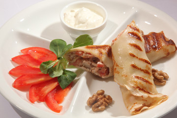 roll with meat on plate