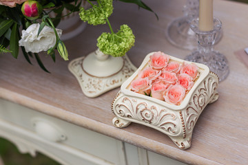 Pink roses in a ceramic box on the table-2