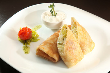 pancakes stuffed with cheese and onions