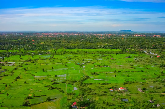 Aerial view of Siem Reap city and green fields, Cambodia
