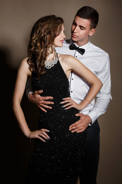 Fashion man and woman gorgeous couple loving , vogue style isolated