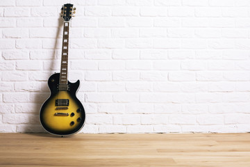 Electric guitar in studio - Powered by Adobe