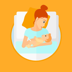 Obraz premium Woman with new born in maternity ward