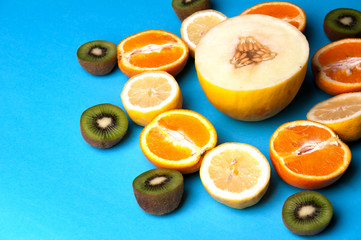 Healthy fruits on a blue background from above
