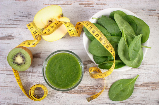 Ingredients, fresh cocktail from spinach and centimeter on wooden background, healthy nutrition and slimming