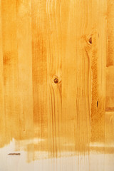 Yellow wood board texture painted with acrylic paint