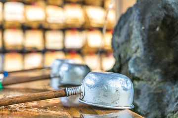 religion dipper with wood handle in tokyo temple