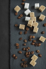 Sugar cubes and coffee beans