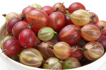 Gooseberries close-up on white