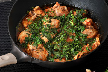 Chakhokhbili - traditional Georgian dish. Chicken stewed with he
