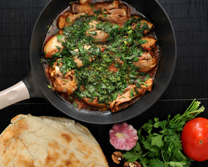 Chakhokhbili - traditional Georgian dish. Chicken stewed with he