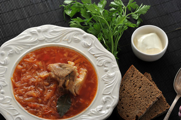 traditional Russian soup - borsch with cabbage, sour cream