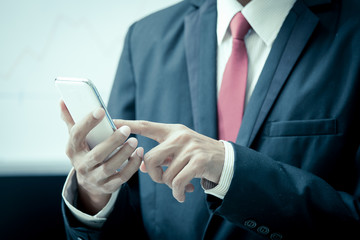 Businessman is using smart phone,tablet,cellphone