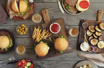 Different burgers and beer