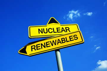 Nuclear - Renewables - Traffic sign with two options - deciding between atomic and alternative electricity ( solar energy, wind ) . Question of waste, safety, danger, effectiveness, ecology